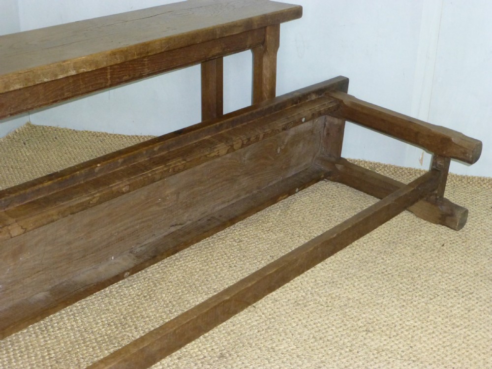 Fabulous pair of trestle design 19th century oak benches. Circa 1870. View IX