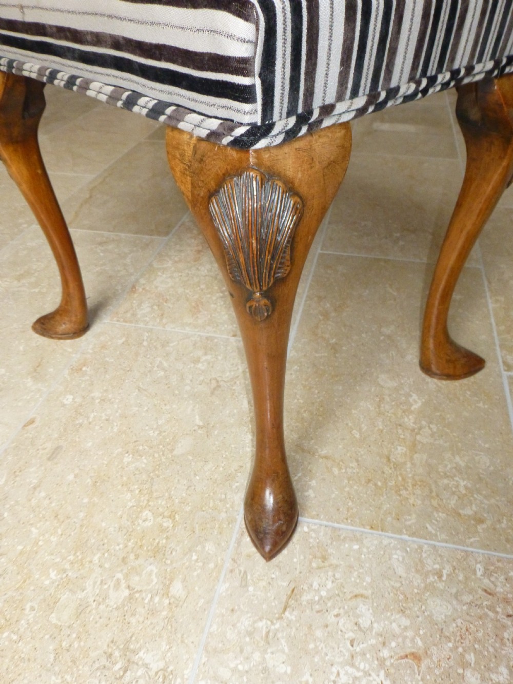 A Queen Anne style walnut upholstered footstool dressing table stool. C1900 View II