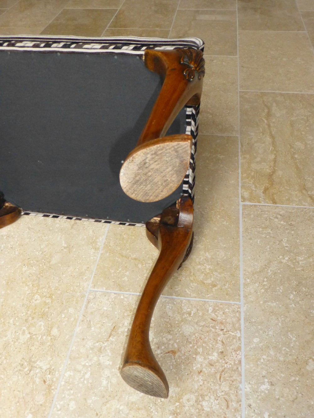 A Queen Anne style walnut upholstered footstool dressing table stool. C1900 View IV