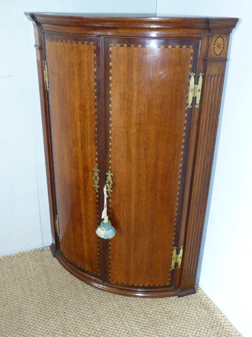 Georgian 18th century bowfront oak and mahogany hanging bow barrel front hanging corner cupboard cabinet. c1800