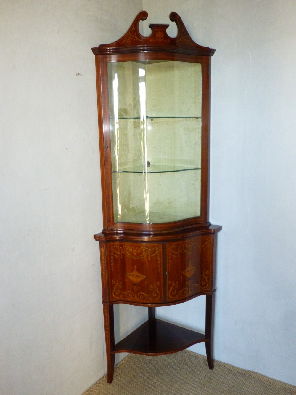 Superior Edwards and Roberts mahogany marquetry inlaid serpentine shaped  fronted standing double height corner cupboard cabinet. C1900.