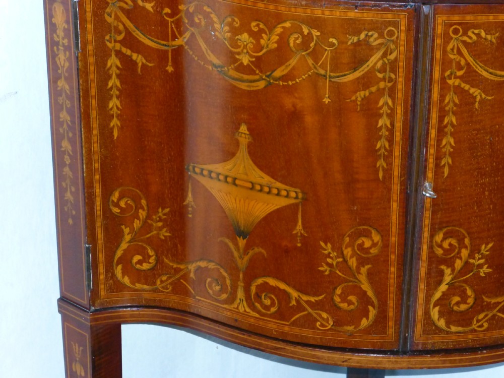 Superior Edwards and Roberts mahogany marquetry inlaid serpentine shaped  fronted standing double height corner cupboard cabinet. C1900. View V