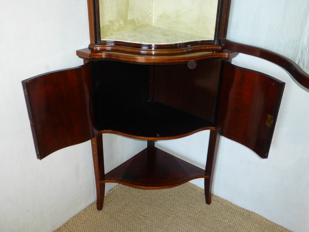 Superior Edwards and Roberts mahogany marquetry inlaid serpentine shaped  fronted standing double height corner cupboard cabinet. C1900. View IX
