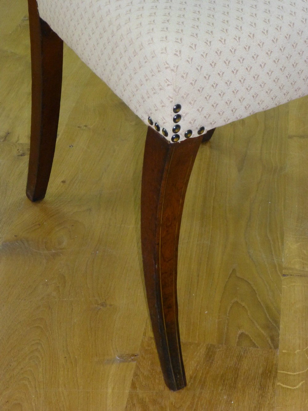 A good quality set of four mahogany  Regency brass inlaid dining chairs. C1810 View VI