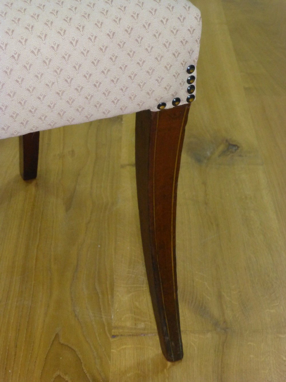 A good quality set of four mahogany  Regency brass inlaid dining chairs. C1810 View VIII
