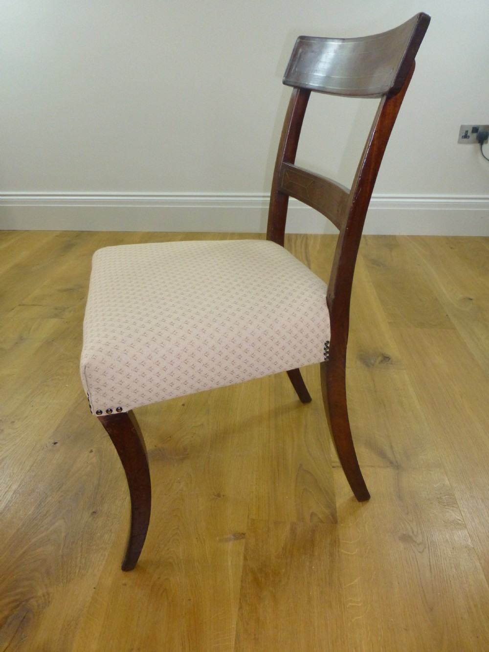 A good quality set of four mahogany  Regency brass inlaid dining chairs. C1810 View IX