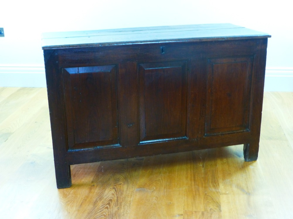 A small early 18th century Welsh triple panel oak coffer