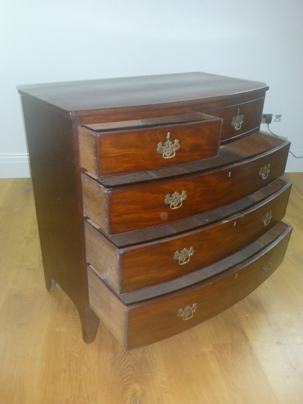 Regency Georgian mahogany bowfront oak lined chest of drawers View II