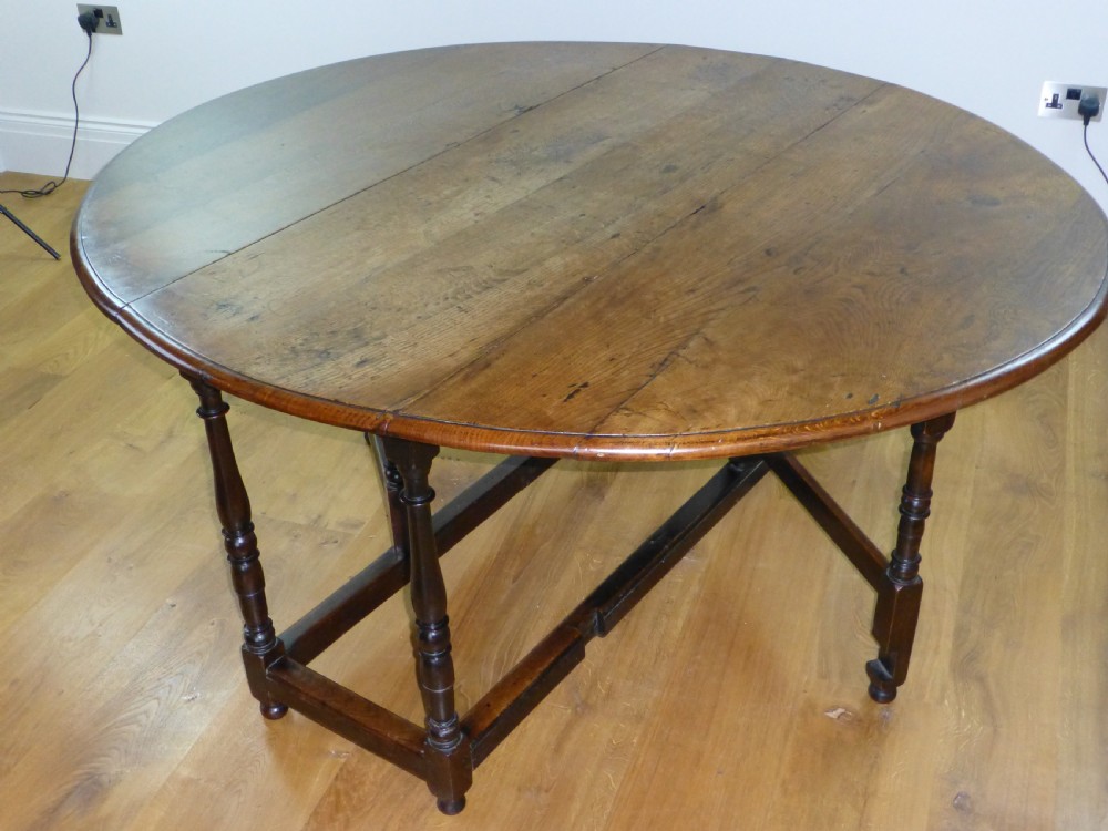 Fabulous large 18th century Welsh oak gateleg oval drop leaf dining table View IV