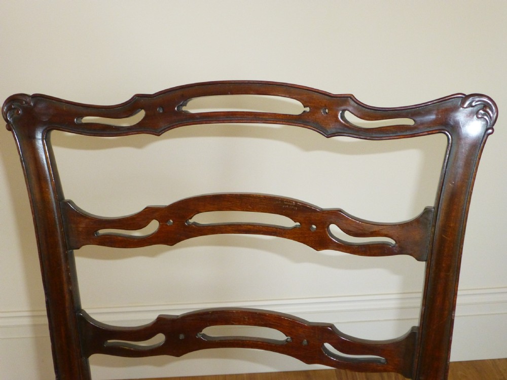 Antique set of 12  twelve ( 10 plus 2 ) 19th century Georgian Chippendale design mahogany upholstered ribbon back dining chairs ten plus two  View X
