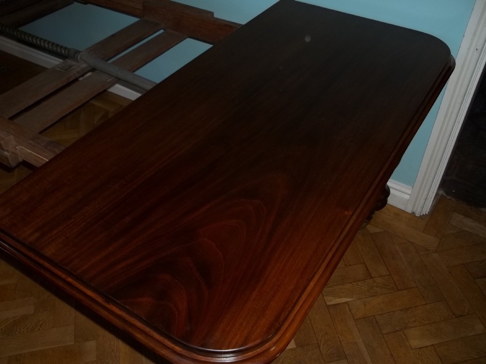 Lovely quality wind-out extending mahogany dining table with four leaves windout winding to seat 10 / 12  people View V