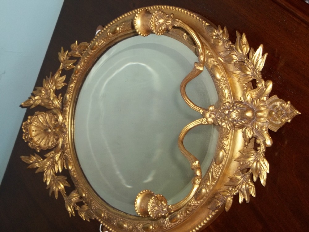 Pair of Regency water gilded oval gilt girandole mirrors View V