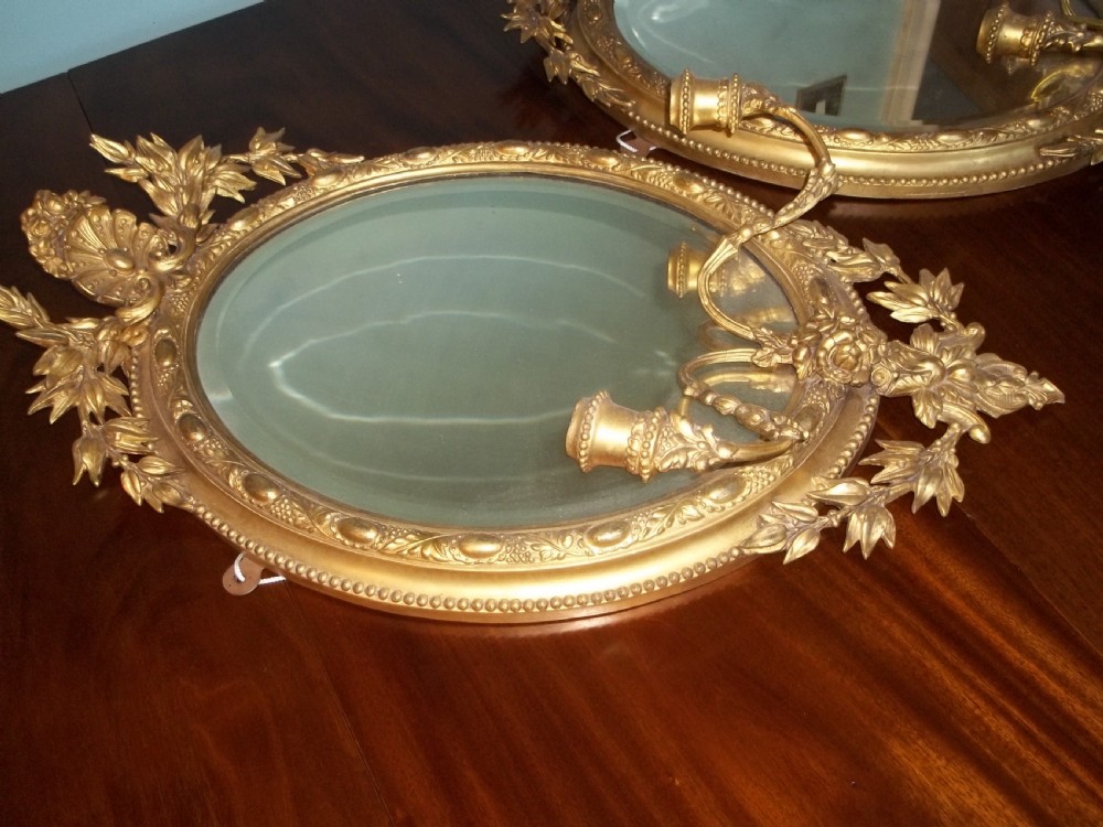 Pair of Regency water gilded oval gilt girandole mirrors View VI