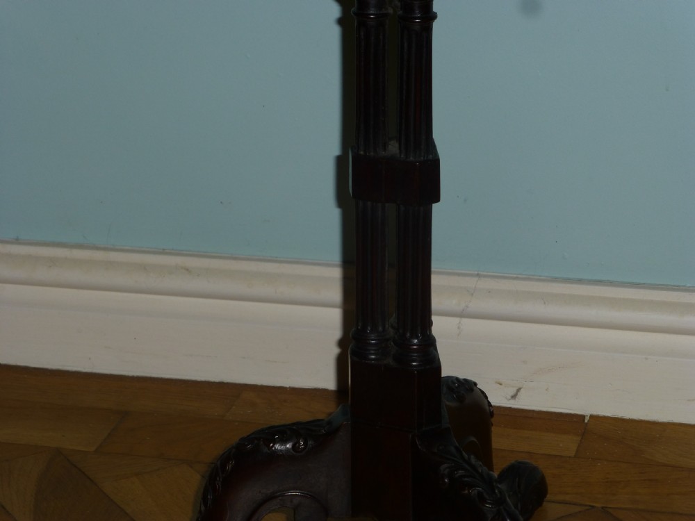A dark brown Regency tripod side table featuring a carved rectangular pie crust top mounted on a turned pedestal shaft with three scrolled legs. View VI