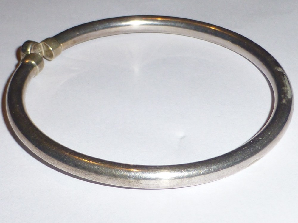 Silver and oval cabochon ruby  bangle View II