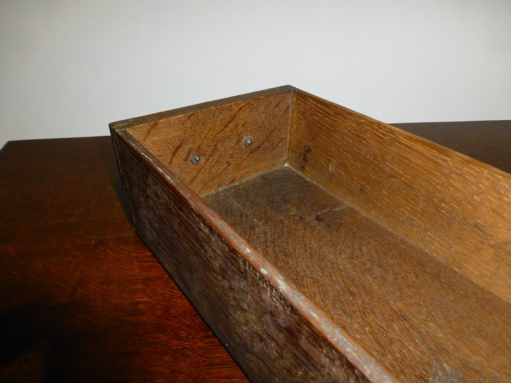 An 18th-century Georgian mahogany lowboy table featuring cabriole legs, brass batwing drawer pulls, and a shaped apron. View X
