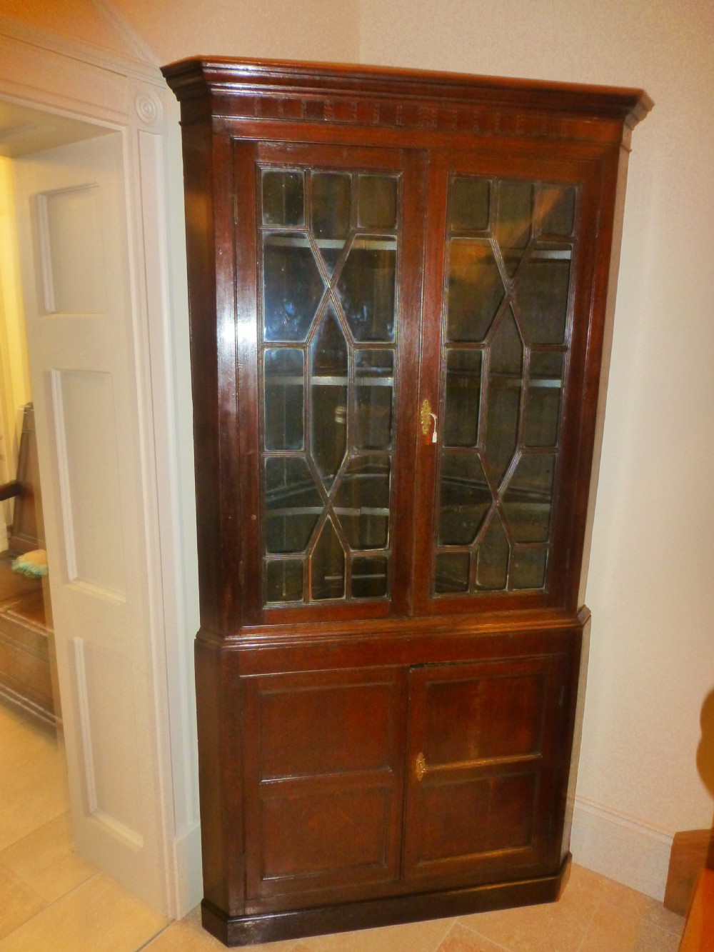 Welsh 18th century oak standing double height corner cupboard cabinet