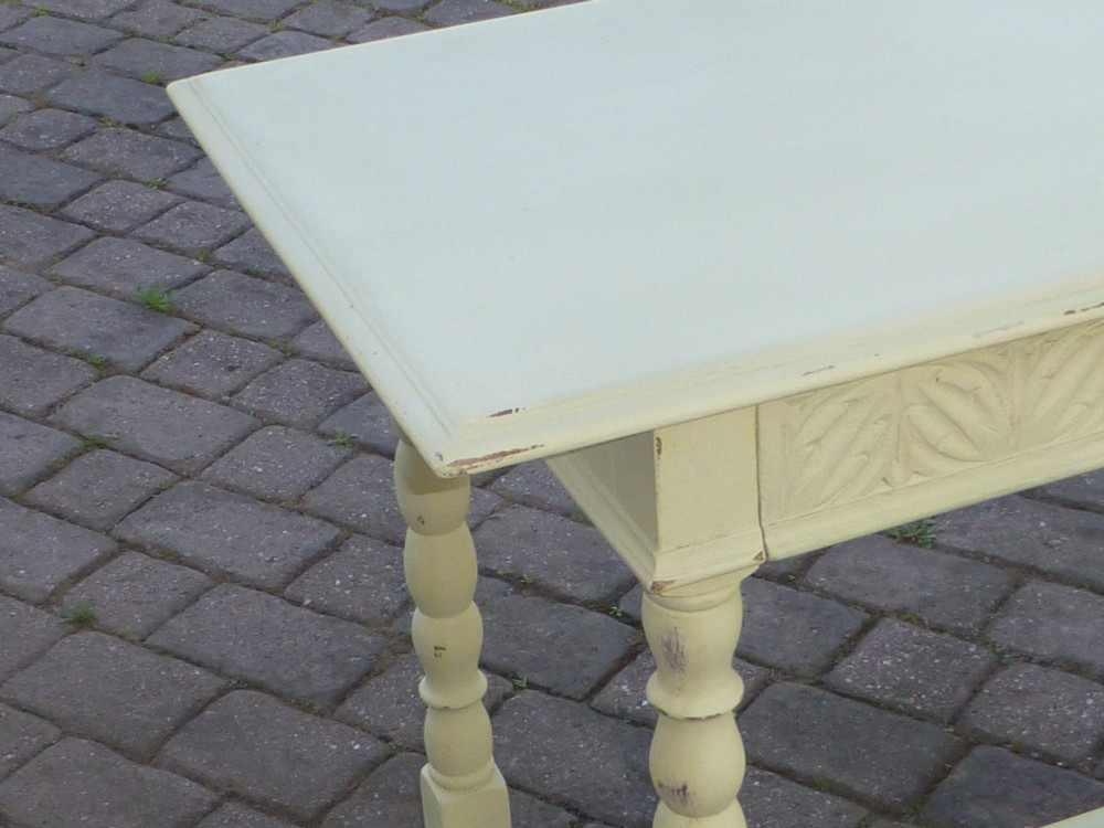 A late 19th-century cream-painted oak console table with a carved single drawer and turned legs connected by a low stretcher. View III