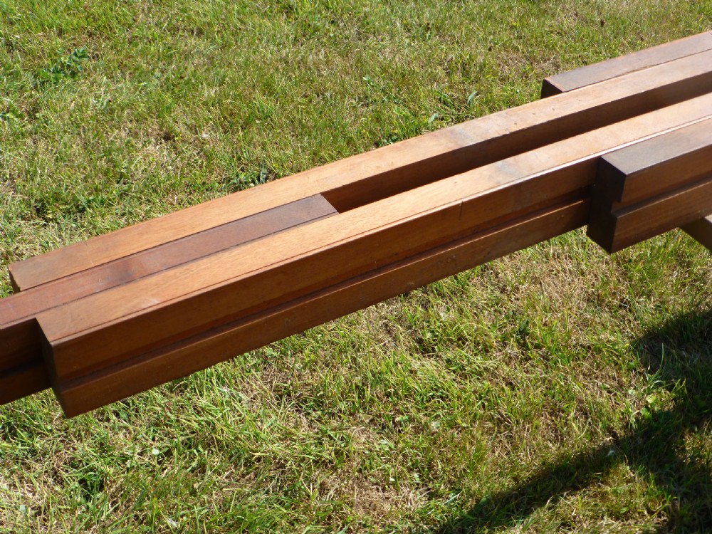 A large Regency extending mahogany dining table featuring a polished rectangular top, three extension leaves, and turned wood legs. View VII