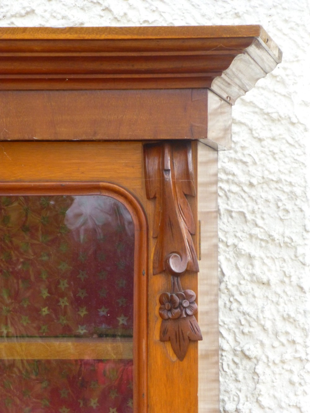 A two-part antique oak and mahogany dresser featuring a triple glazed upper display section above a lower cupboard with carved shaped door panels. View II