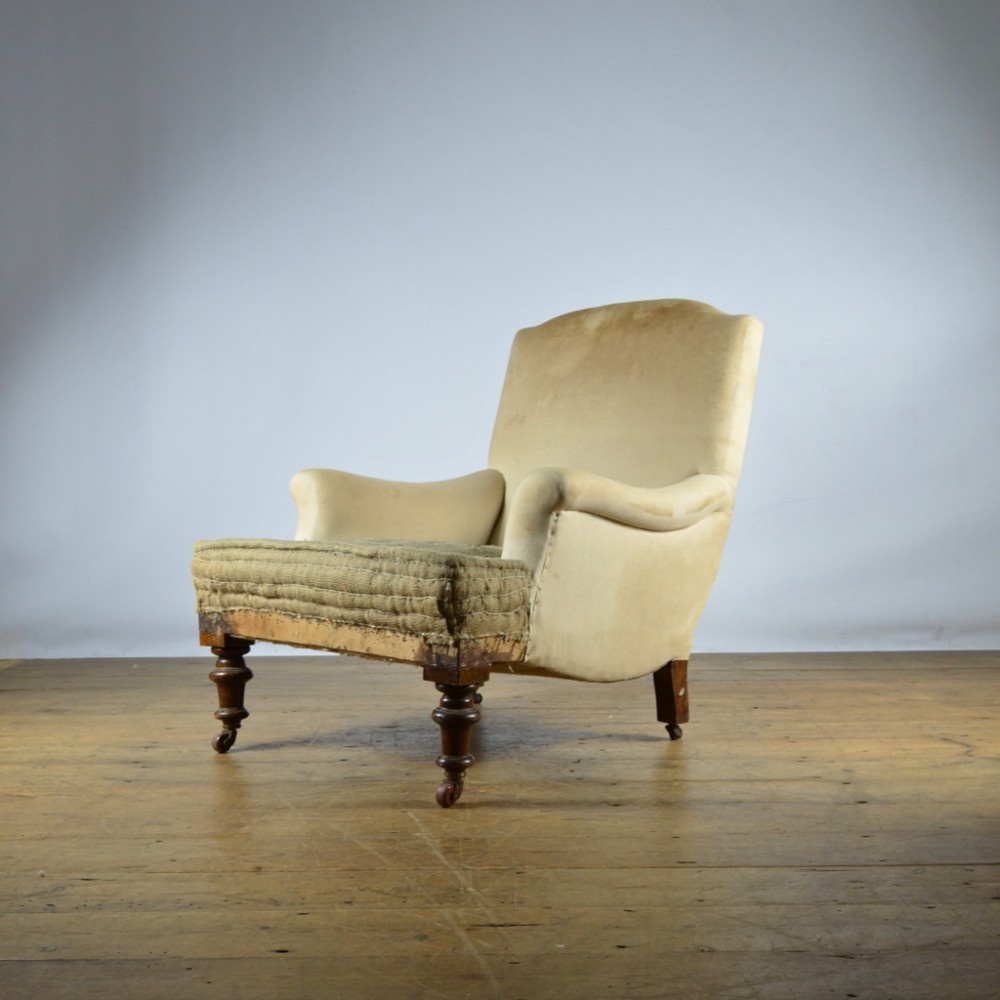 SHAPED ENGLISH ARMCHAIR, REUPHOLSTERY INC - C309