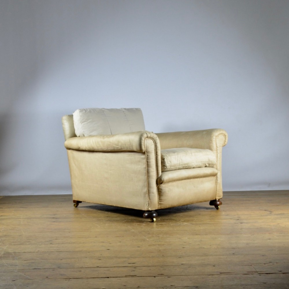 DEEP SEATED ENGLISH ARMCHAIR - REUPHOLSTERY INC.