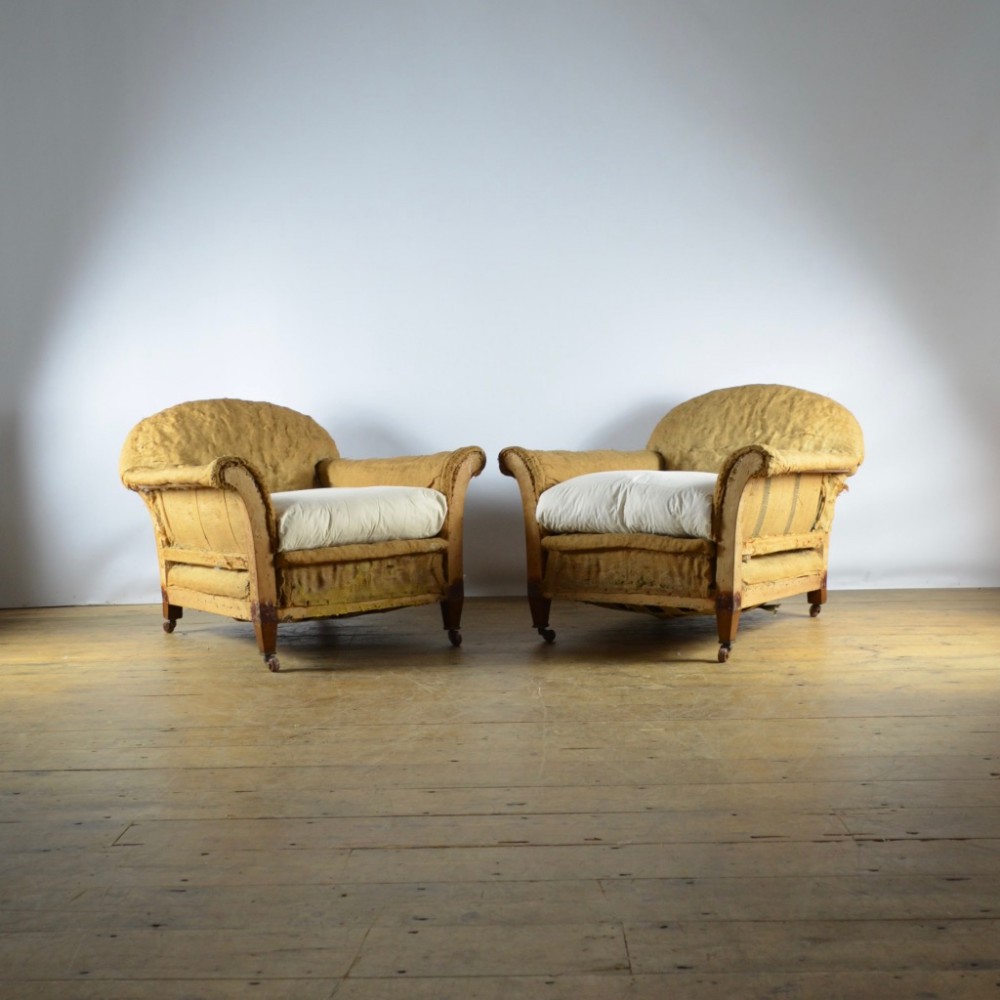 PAIR OF DEEP SEATED ENGLISH ARMCHAIRS - FULL REUP.