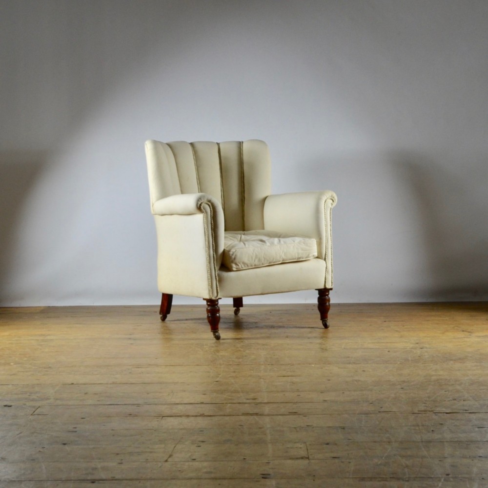 FLUTED BACK ARMCHAIR - FULL REUPHOLSTERY INC.