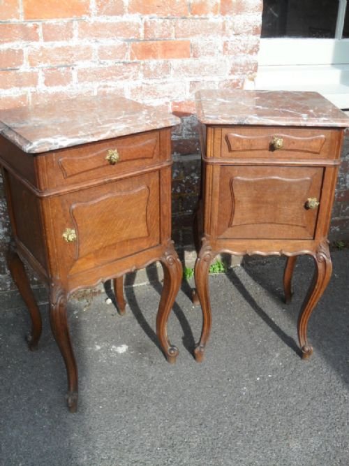Pair of French Oak Marble Top Bedside Tables
