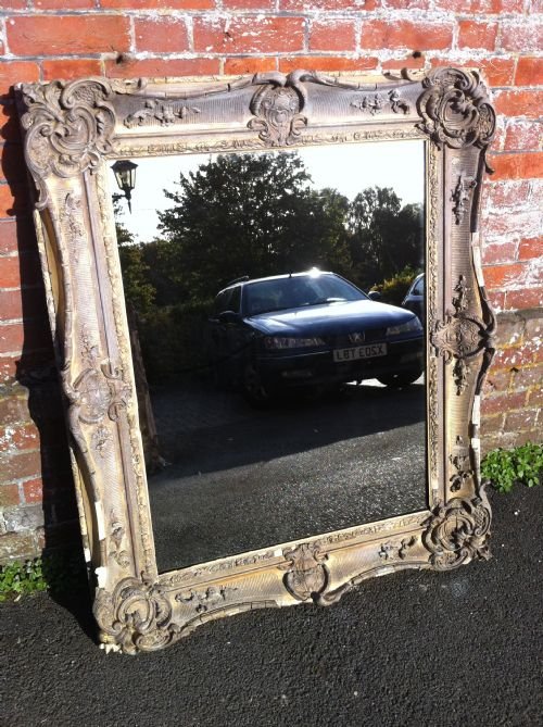 Early 19th Century English Distressed Wall Mirror.