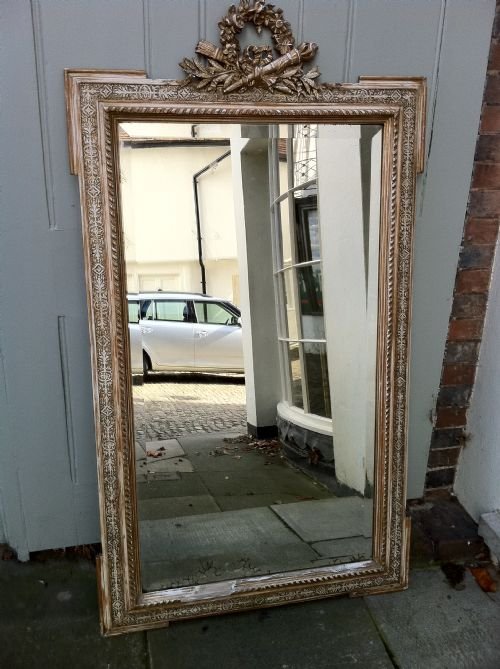 A Stunning 19th Century French Cream and Gilt Gesso Mirror.
