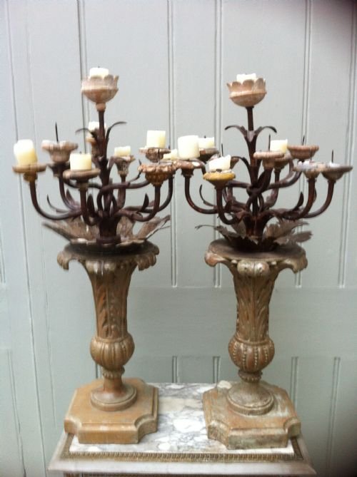 A Highly Decorative Pair of Carved Wood and Tole Early 19th Century Candelabra.