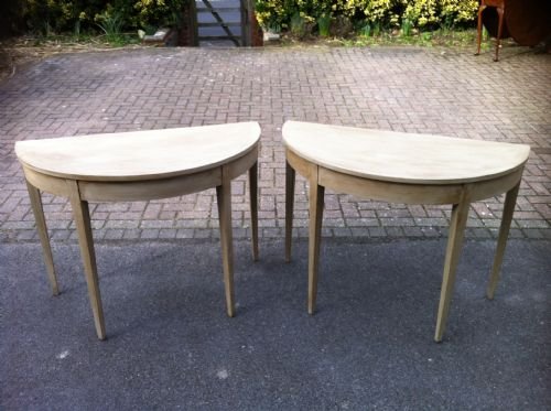 A Pair of Painted 19th Century Demi Lune Tables.