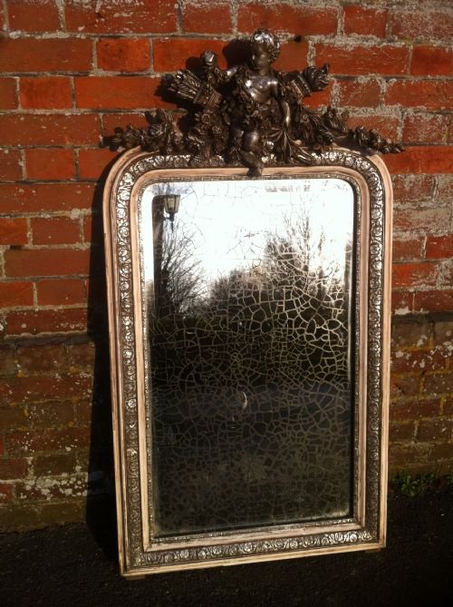 Early 19th Century French Silvered Cherub Wall Mirror.