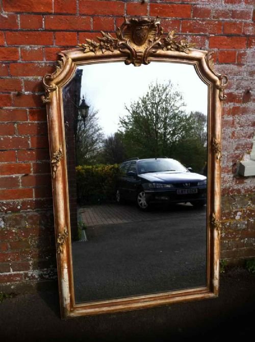 Large Arched Top 19th Century French Carved Wood and Gesso Wall Mirror.
