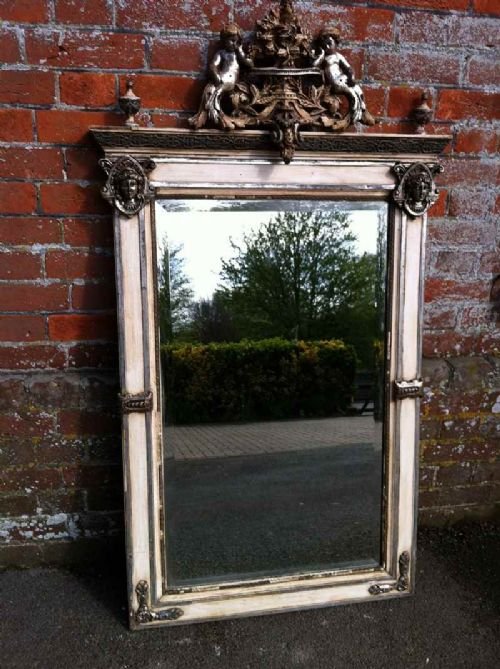 Early 19th Century Unusual Silvered and Cherub Wall Mirror.