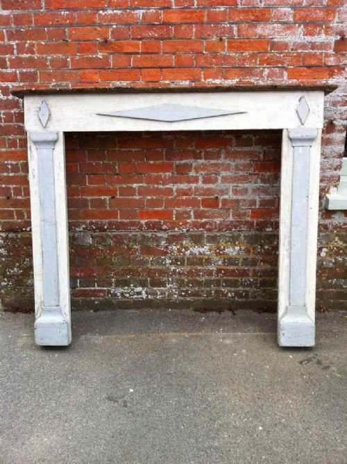 A Georgian Original Painted Carved Wood Fire Surround.