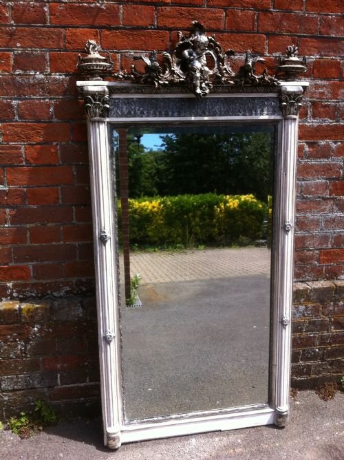 A Highly Decorative 19th Century French  Bird and Cherub Mirror.