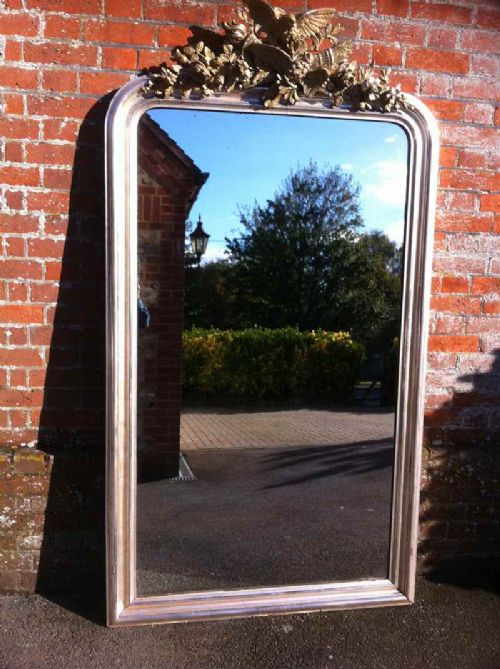 Lage Highly Decorative 19th Century French Silvered Arched Top Antique Mirror.