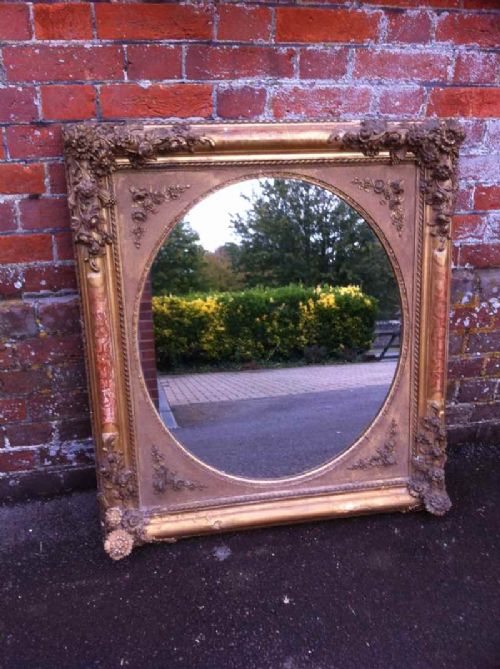 19th Century French Carved Wood and Gesso Gilt Distressed Mirror.