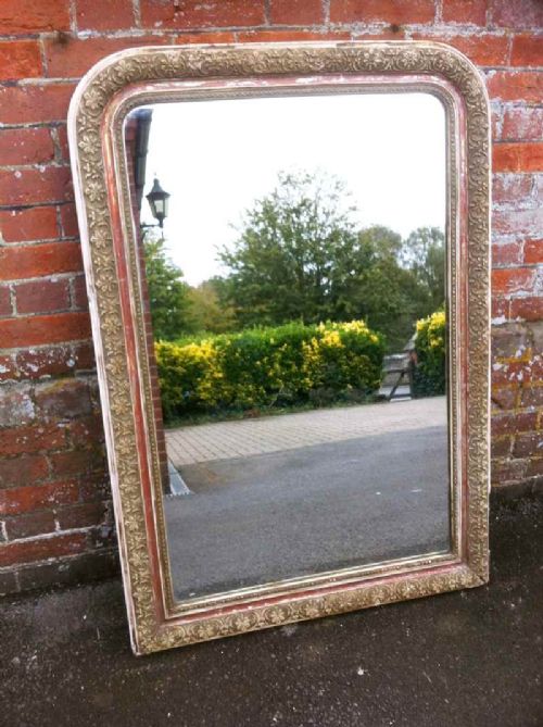 A Large 19th Century French Decorative Carved Wood and Gesso Arched Top Mirror.
