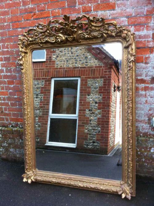 A Large 19th Century French Carved Wood and Gesso Gilt Mirror