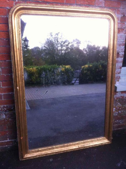 Large 19th Century Good Sized Gilt Arched Top Carved Wood and Gesso Mirror.