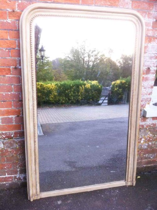 Large 19th Century Arched Top Carved Wood and Gesso Mirror.