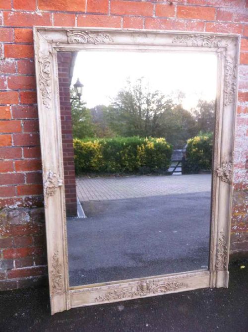 Large Early 19th Century French Carved Wood and Gesso Distressed Painted Overmantel Mirror.
