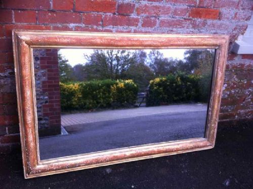 Highly Useful Early 19th Century French Carved Wood and Gesso Large Gilt Mirror.