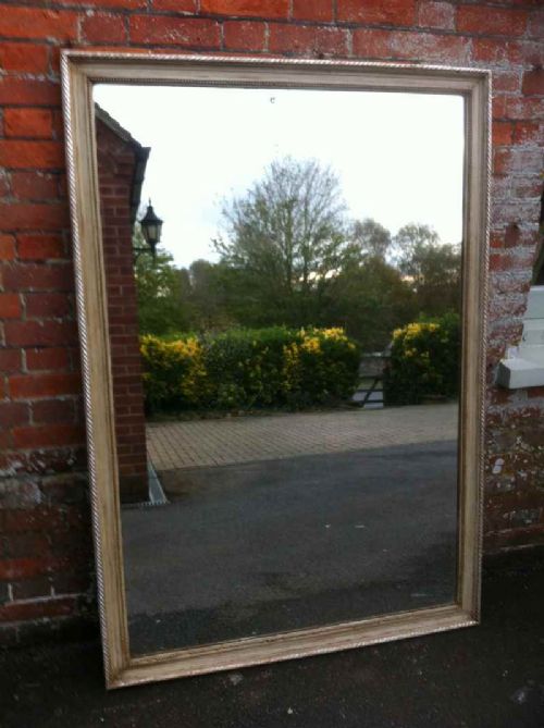 A Stunning Highly Decorative Large 19th Century French Carved Wood and Gesso Landscape or Portrait Mirror.