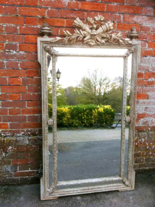 A Stunning Early 19th Century French Highly Decorative Painted Carved Wood and Gesso Cushion Mirror.