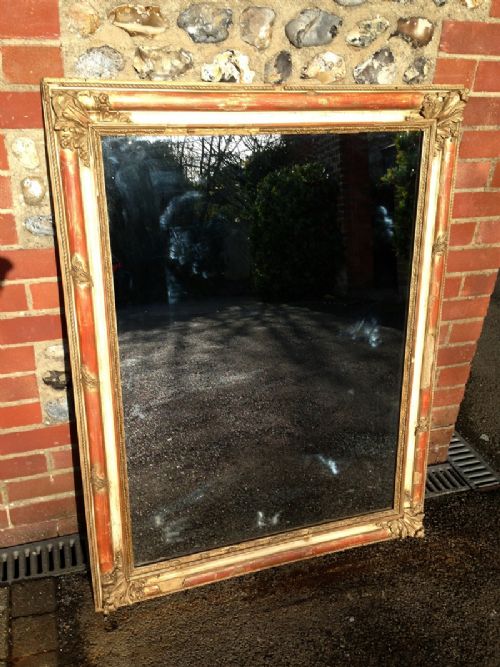 A Large  19th Century French Cream Gilt & Red Gesso Distressed Mirror.