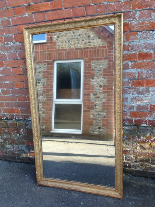 A Large Antique French Gilt Carved Wood and Gilt Mirror